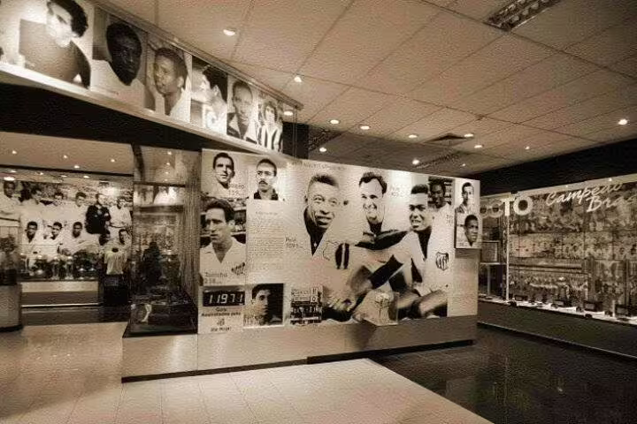 Football legends exhibit at a museum in Santos, part of the 7-hour shared group tour with Mont Serrat and coffee highlights.