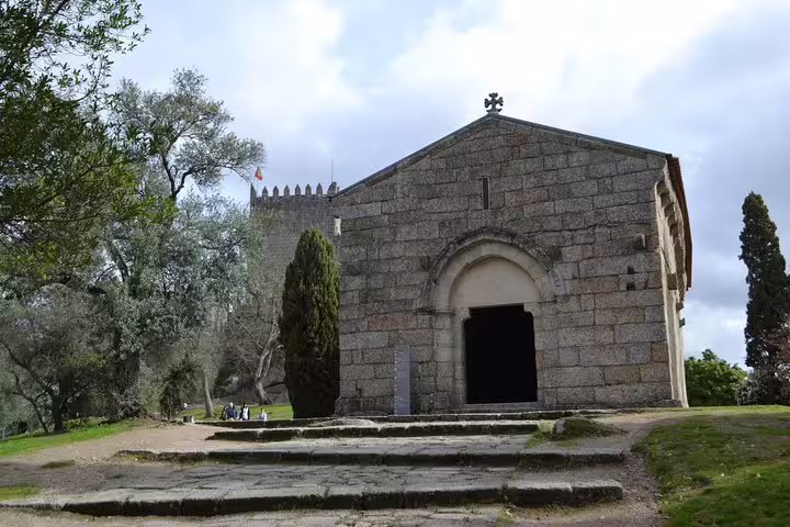 Visit the Romanesque São Miguel do Castelo Church in Guimarães on a half-day private tour from Porto.