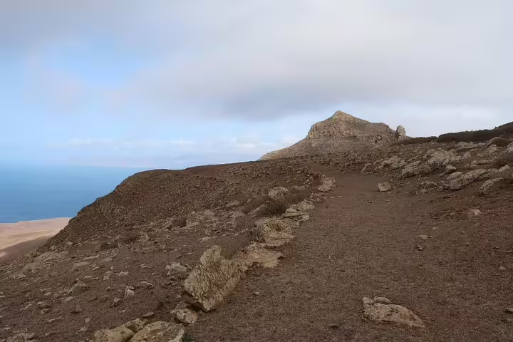 Expansive mountain views with rocky terrain on the scenic Juncalinho Trail in São Nicolau, Cape Verde.