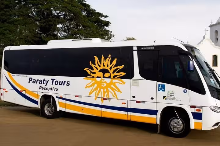 Paraty Tours shuttle bus parked, offering comfortable travel from São Paulo to Paraty with reliable service.
