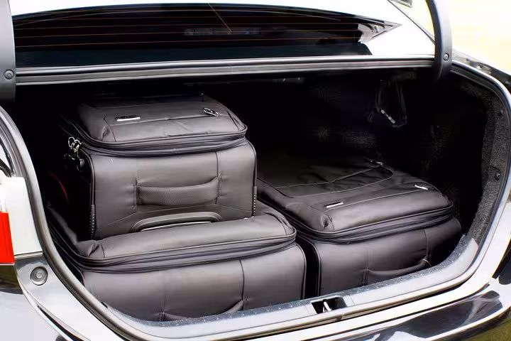 Spacious car trunk filled with luggage for convenient transport on the shared shuttle from São Paulo to Paraty.