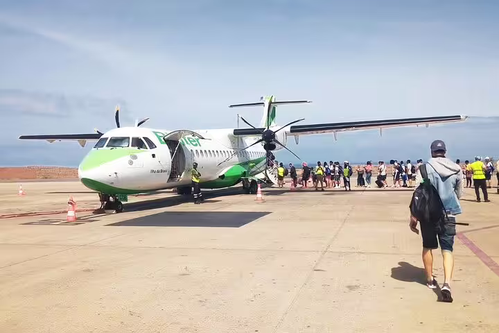 Passengers disembarking at São Vicente airport, book private transfer from Cesária Évora Airport to São Pedro
