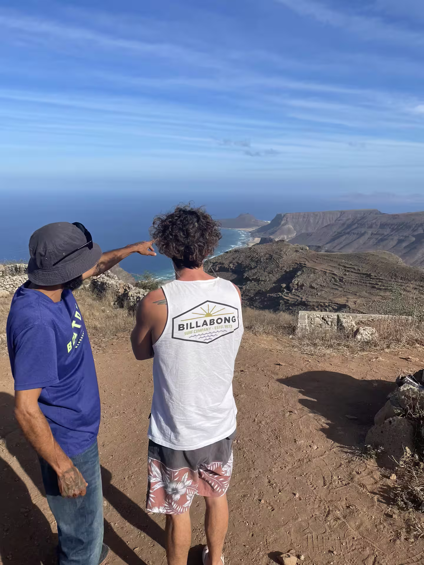 Tourists enjoy breathtaking views on a São Vicente half-day tour, exploring beaches, villages, and Monte Verde landscapes.