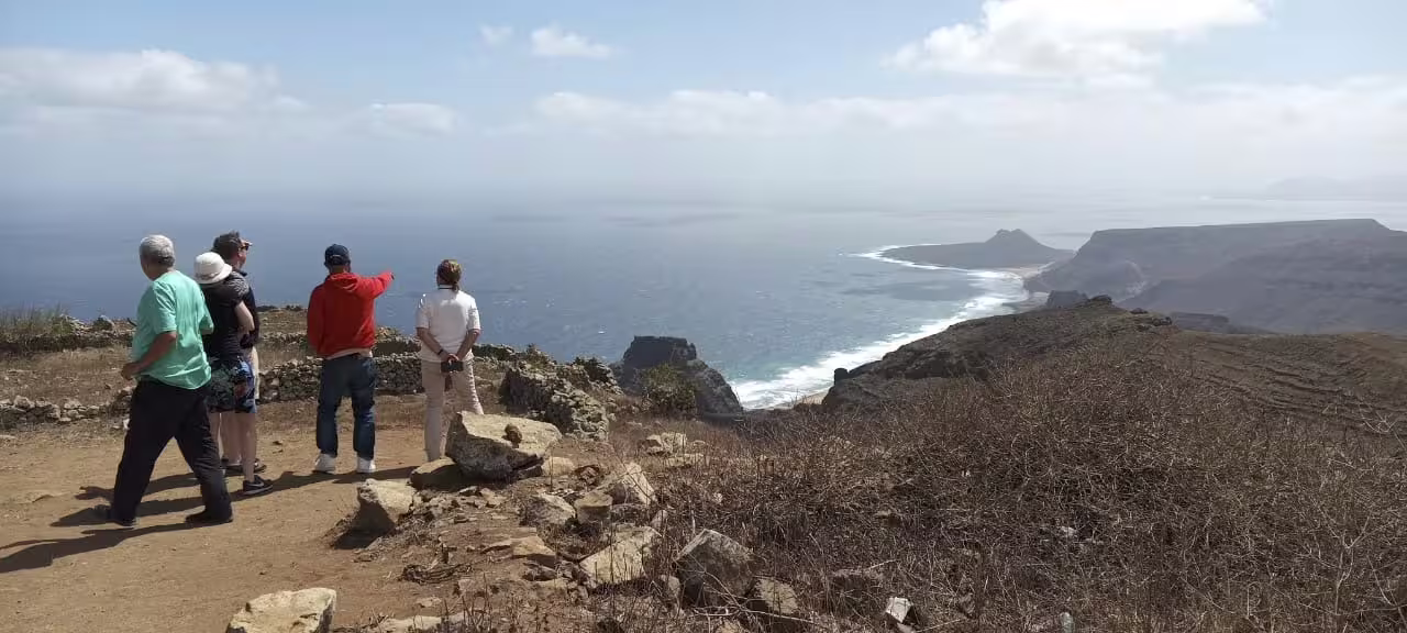 Tourists admire the breathtaking coastal views of São Vicente during a full day island tour from Mindelo, Cape Verde.