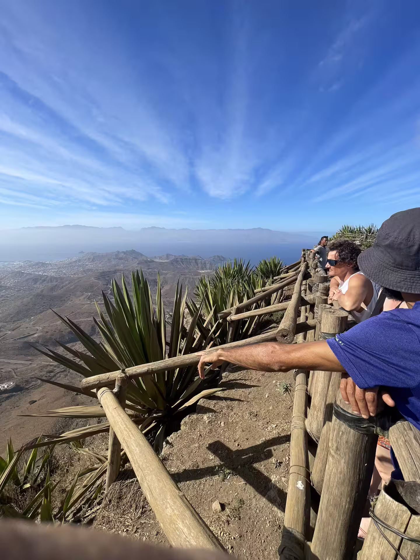 Tourists enjoying panoramic views from a scenic lookout on a São Vicente shore excursion in Mindelo, Cape Verde.
