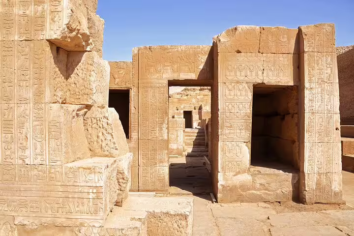Carved limestone temple corridor at Saqqara necropolis on private guided tour with transfers and lunch