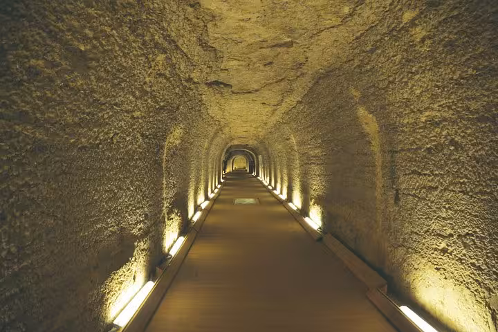 Illuminated underground passage inside Saqqara pyramid complex on Saqqara, Dahshur and Memphis tour with lunch