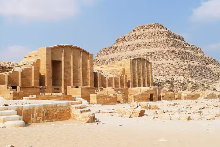 Saqqara funerary complex ruins with Step Pyramid backdrop on private Dahshur, Memphis and Saqqara tour from Cairo
