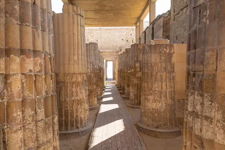 Columned corridor at Saqqara temple ruins on private guided tour from Cairo with transfers and lunch