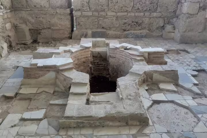 Ancient stone baptismal font at Sardis on Seven Churches of Revelation 5-day mini group guided tour