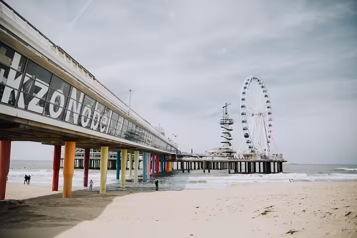 Scheveningen Pier and Ferris wheel in The Hague, scenic stop on Amsterdam to The Hague private transfer