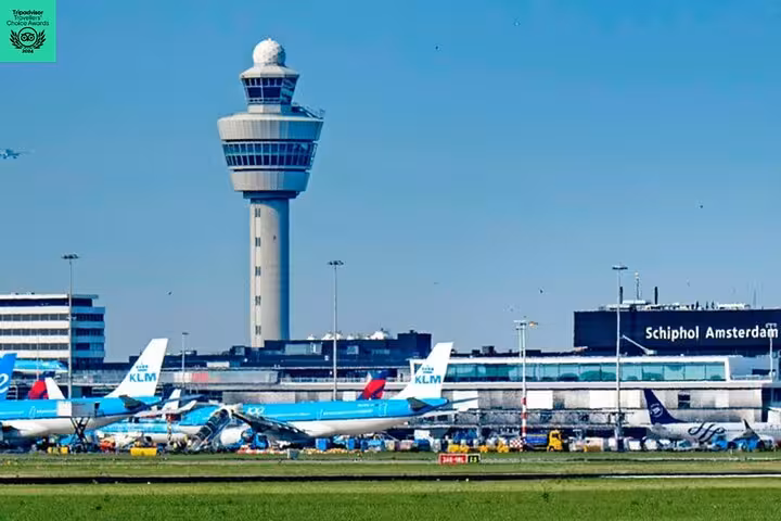Schiphol Amsterdam Airport terminal and control tower, ideal for private departure transfer and chauffeur pickup
