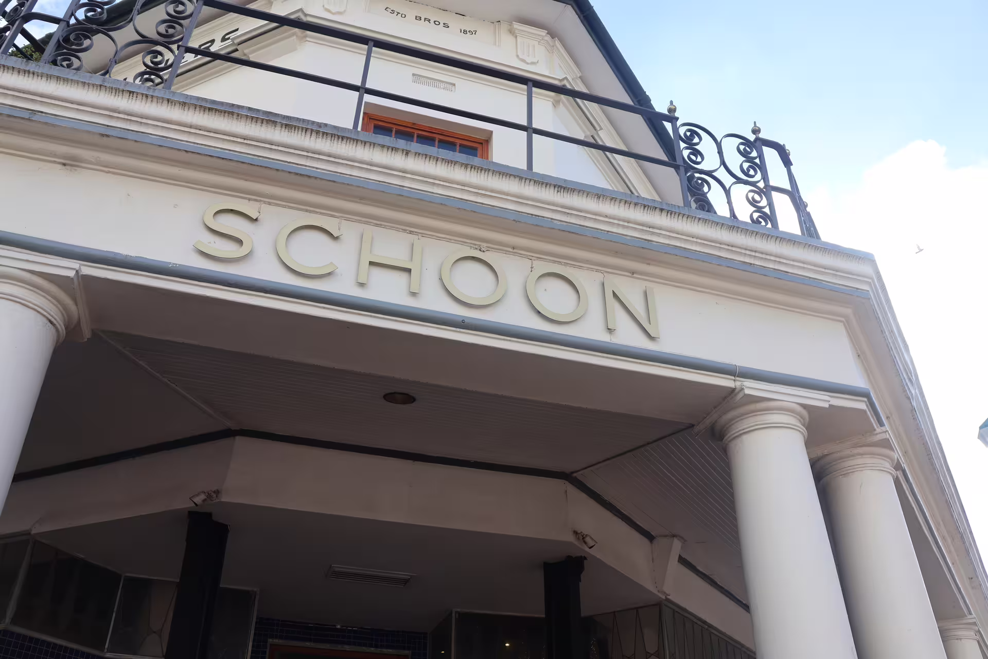 Historic Schoon building facade in Stellenbosch, a highlight on the Franschhoek wine tram day tour.