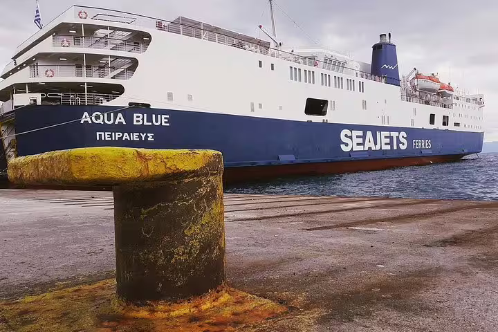 Seajets Aqua Blue ferry docked at Port of Piraeus, ideal connection after Athens city centre transfer service