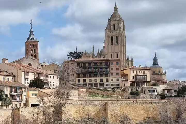 Segovia Cathedral skyline and old town walls, key stop on a half-day private Segovia tour by minivan
