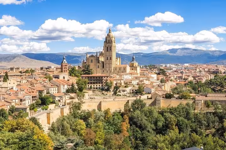 Panoramic view of Segovia's historic skyline, showcasing the cathedral and ancient walls, ideal for a Madrid day trip.