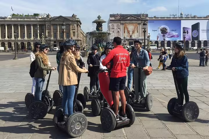Local guide briefing riders on Segways in Place de la Concorde during a private 3-hour Paris city tour