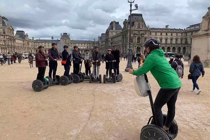 Segway group tour at the Louvre courtyard in Paris with local guide, perfect for a 3-hour private sightseeing ride