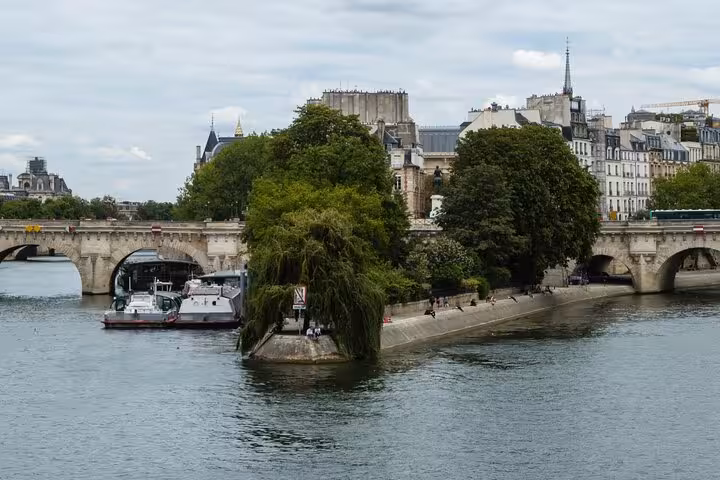 Seine River view by Île de la Cité, perfect stop on ND walking tour with Seine cruise in Paris