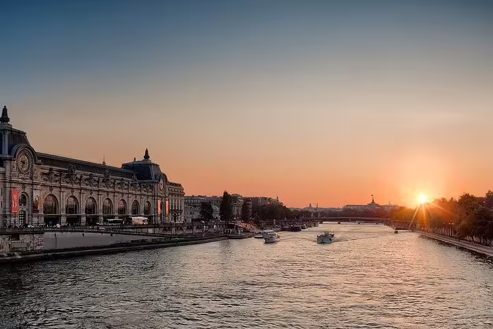 Sunset over the Seine in Paris, ideal start point for a private two-way transfer to Disneyland Paris