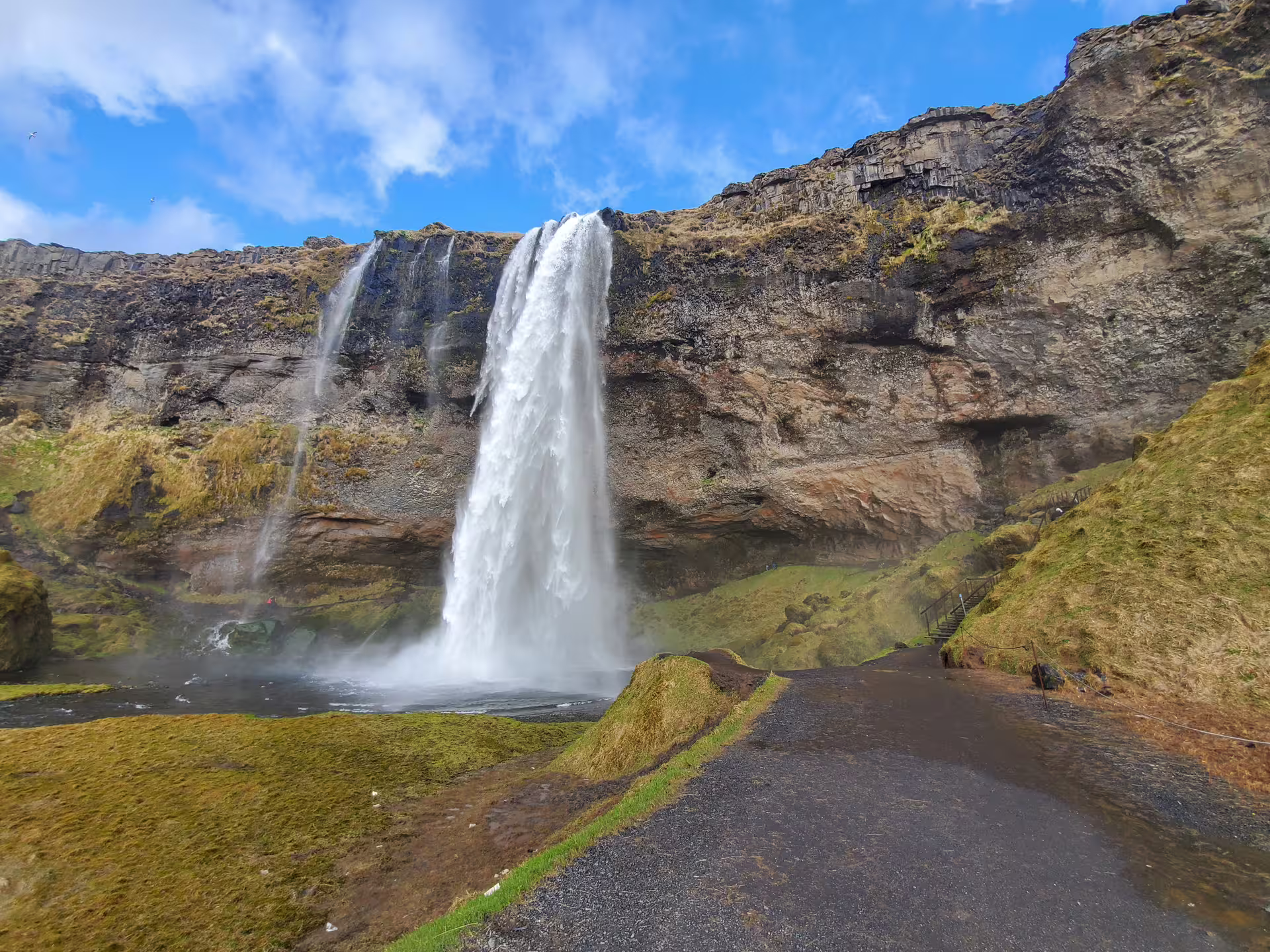 Majestic Seljalandsfoss waterfall cascading down rocky cliffs on Iceland South Coast day trip from Reykjavik