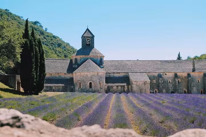 Sénanque Abbey surrounded by purple lavender fields in Provence, France