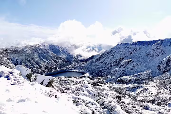 Snow-covered mountain landscape in Serra da Estrela, ideal for off-road tours and cheese tasting adventures.