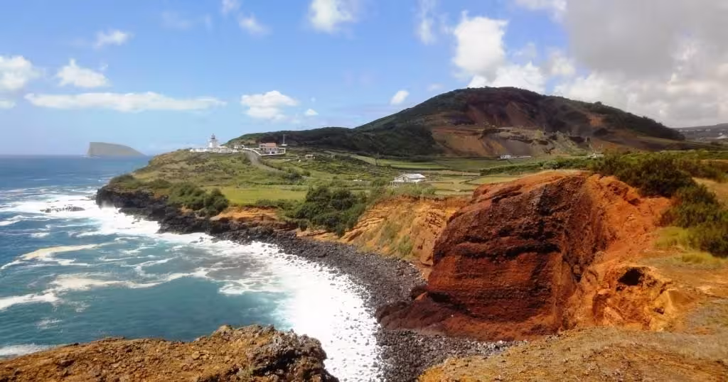 Serra do Cume coastal cliffs and lighthouse viewpoint on Terceira west van tour, Azores, midday stop