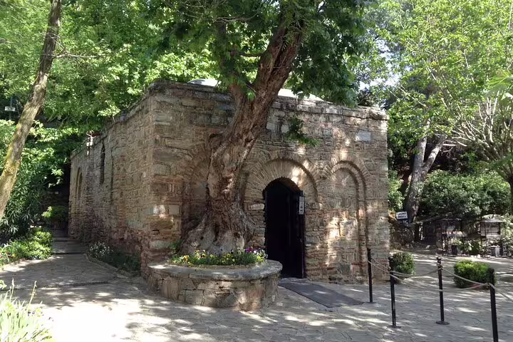 Historic stone chapel in Istanbul garden, a serene stop on 7 Churches of Revelation 10-day Turkey tour