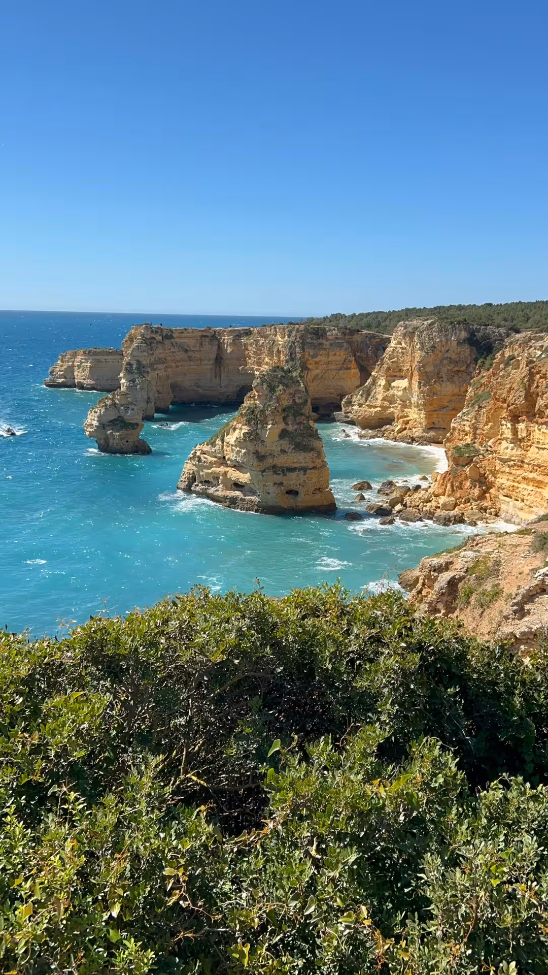 Stunning golden limestone cliffs and turquoise sea views on the Seven Hanging Valleys guided hiking tour in Algarve Portugal