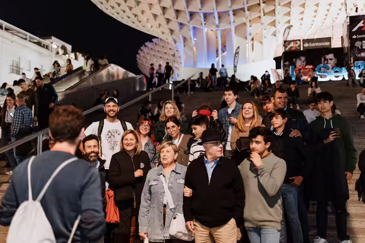 Group enjoying a night at the iconic Metropol Parasol during the Seville Mysterious and Paranormal Tour.