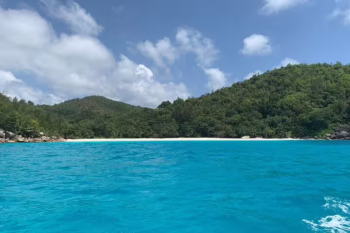 Explore the stunning turquoise waters and lush greenery of Anse Major, perfect for snorkeling and a BBQ adventure.