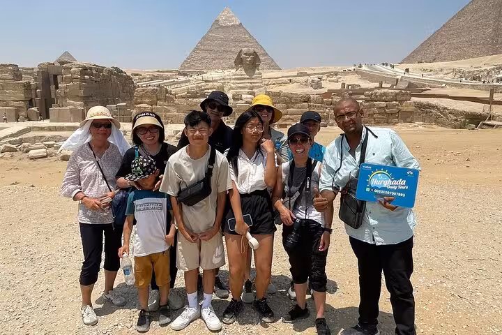 Small group photo at the Sphinx and Great Pyramid, Cairo day trip from Sharm El Sheikh by domestic flight