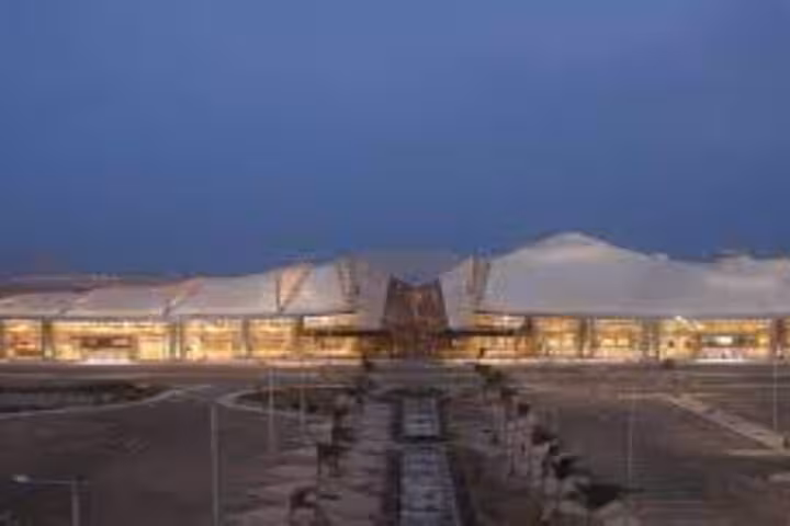 Sharm El Sheikh Airport terminal at night, private transfer service for hotel pickup or airport drop-off