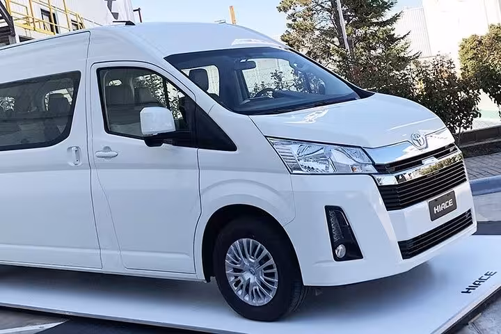 White Toyota Hiace van for private airport transfer in Sharm El Sheikh to hotel comfortable and reliable