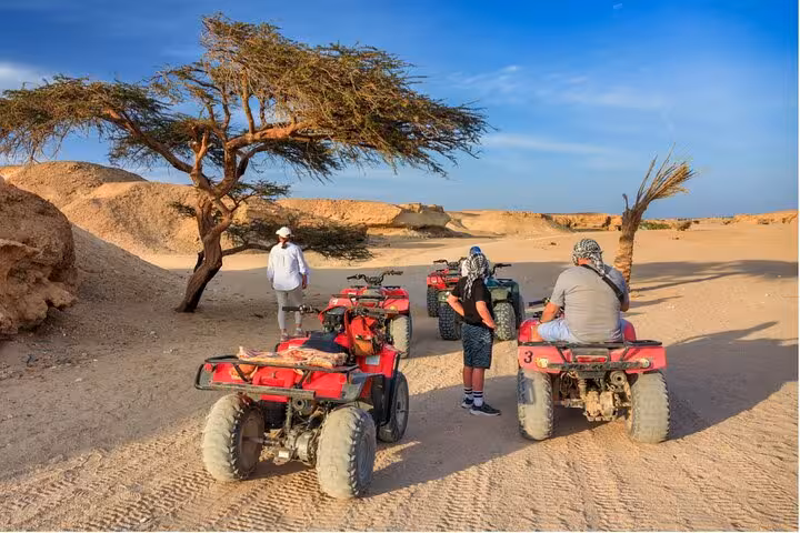ATV quad bikes in Sinai desert near Sharm El-Sheikh, guided off-road adventure before BBQ dinner and stars