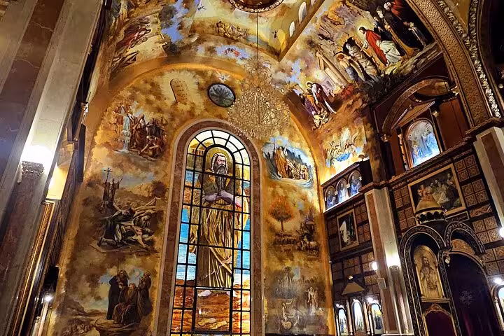Interior of Heavenly Cathedral in Sharm El Sheikh with stained glass and murals on guided city tour