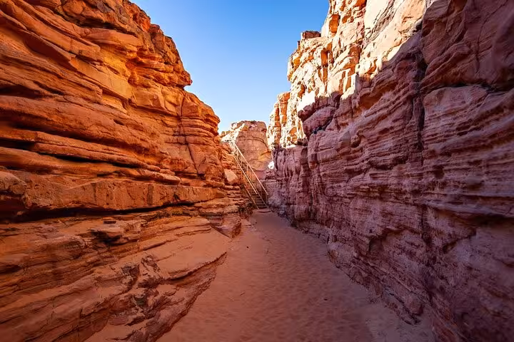 Narrow Sinai canyon trail on Sharm El-Sheikh jeep safari to Colored Canyon and Dahab day trip