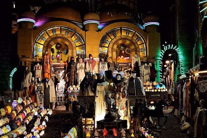Night bazaar in Sharm El Sheikh Old Market with lanterns and traditional dresses on guided city tour