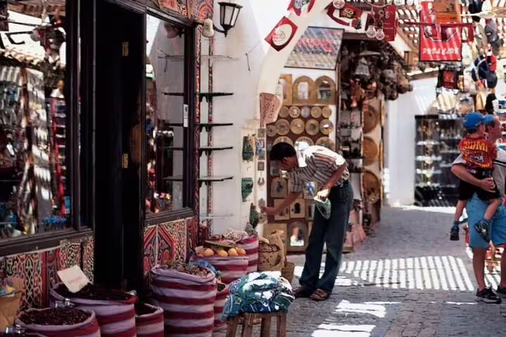 Old Market Sharm El Sheikh bazaar with spice sacks and souvenirs on VIP city tour with Egyptologist guide