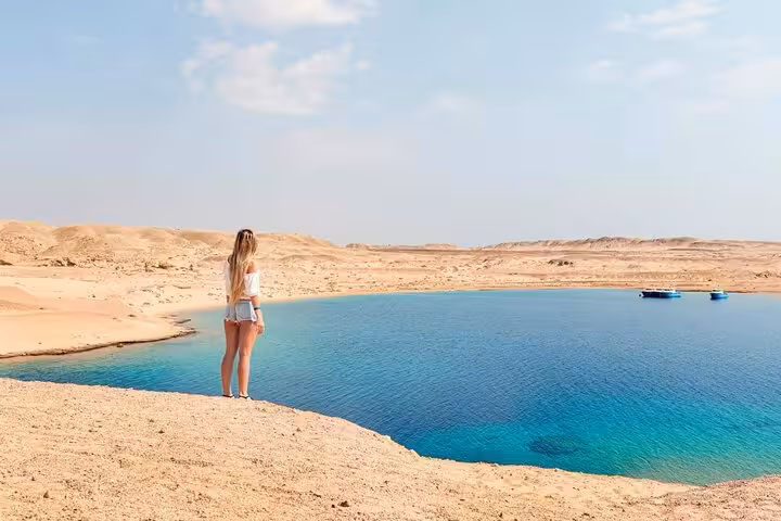 Traveler overlooking Ras Mohamed National Park lagoon on half-day tour from Sharm El-Sheikh, Red Sea views
