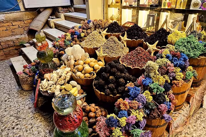 Colorful spice and herb market stall in Old Market on Sharm El Sheikh guided city sightseeing tour