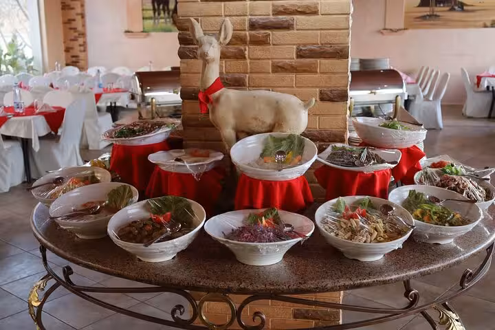 Restaurant buffet table with salads and appetizers for Sharm El Sheikh to Petra day tour by ferry, Red Sea trip