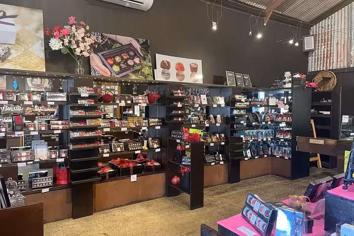 Charming shop displaying a variety of artisanal chocolates on the Sheep World Country Tour from Auckland.