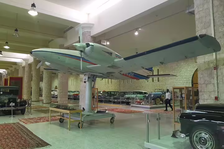 Discover vintage cars and an aircraft exhibit inside the Sheikh Faisal Museum, showcasing Qatar's rich heritage.