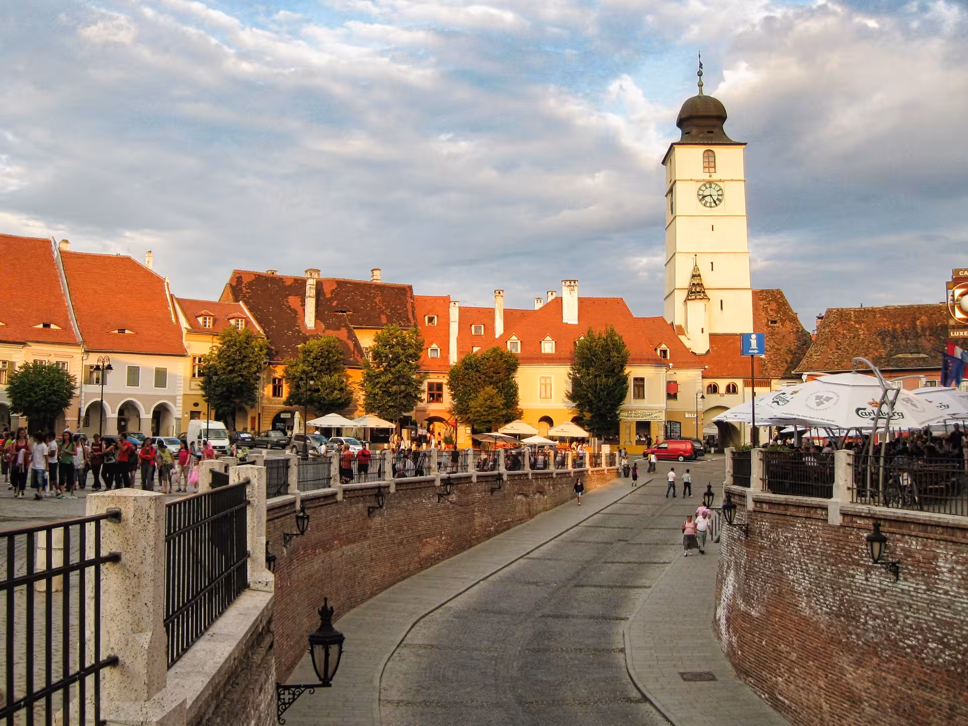 Historic Sibiu old town square with Council Tower and medieval buildings on a sunny day