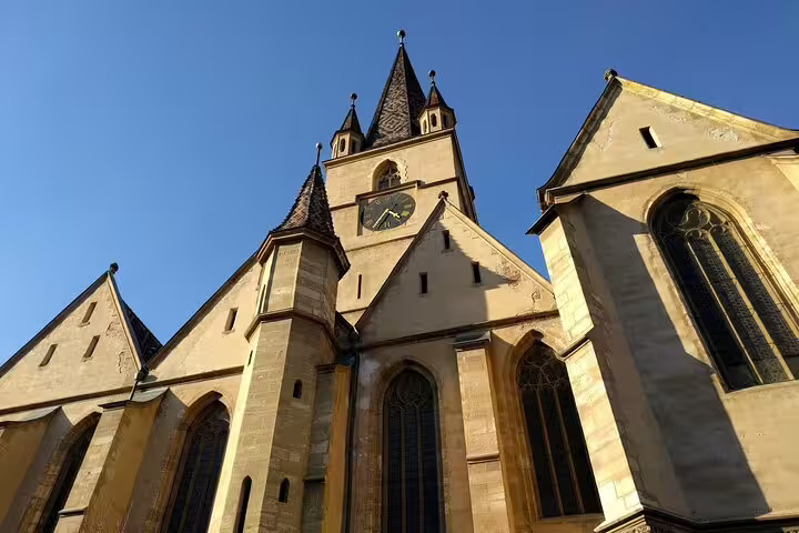 Gothic Lutheran Cathedral of Saint Mary tower and facade in Sibiu Old Town, Romania