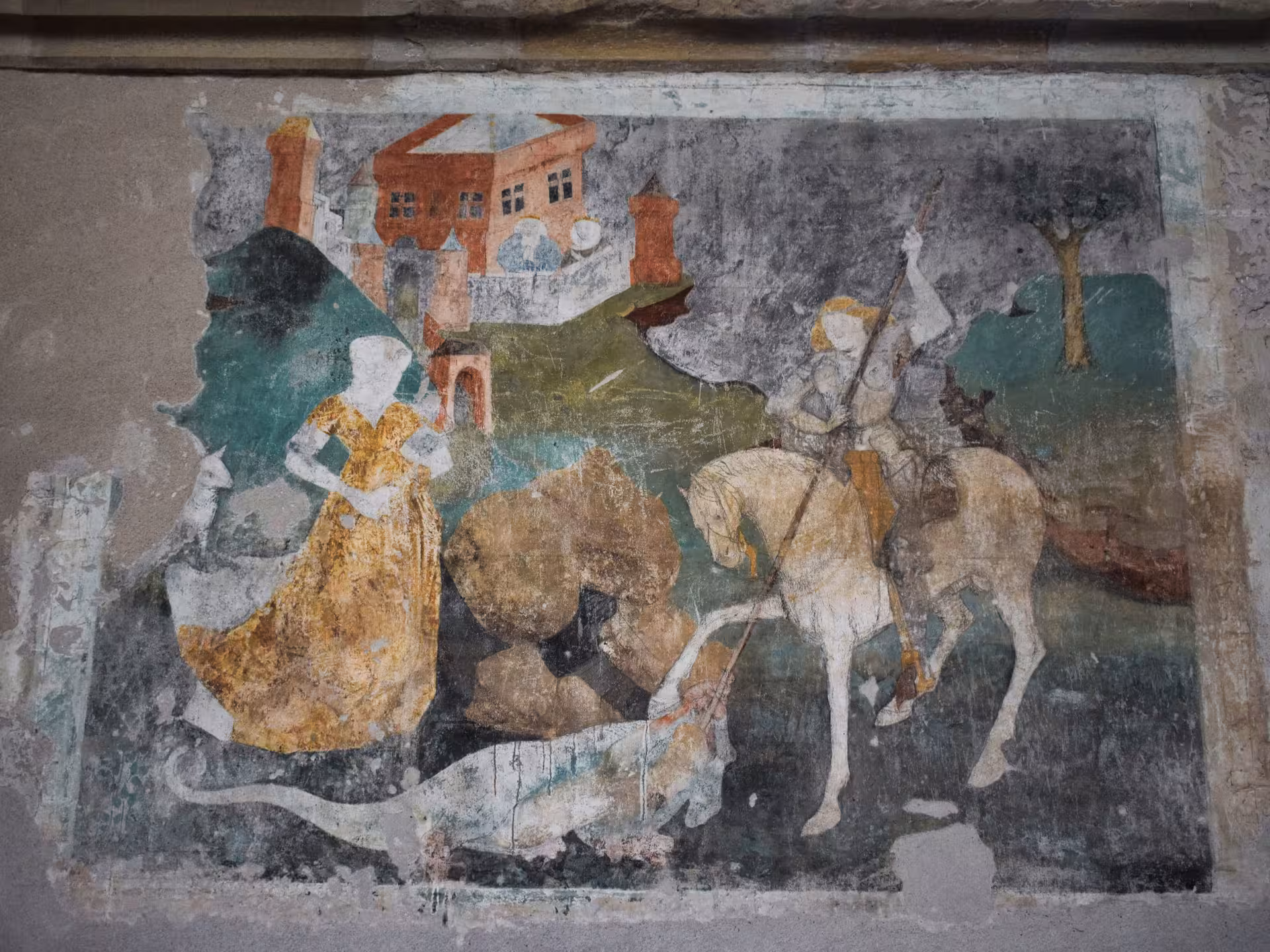 Medieval fresco depicting Saint George slaying dragon with noblewoman and castle in Sighisoara
