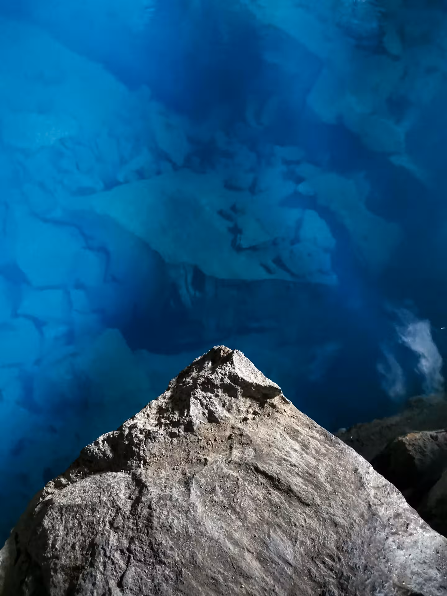 Deep blue Silfra fissure water at Þingvellir, a highlight of Iceland Private Diamond Circle Tour
