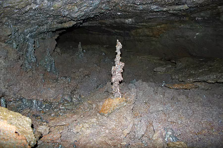 Rugged interior of Leidarendi Lava Tunnel showcasing natural rock formations, ideal for Silfra snorkeling adventure seekers.